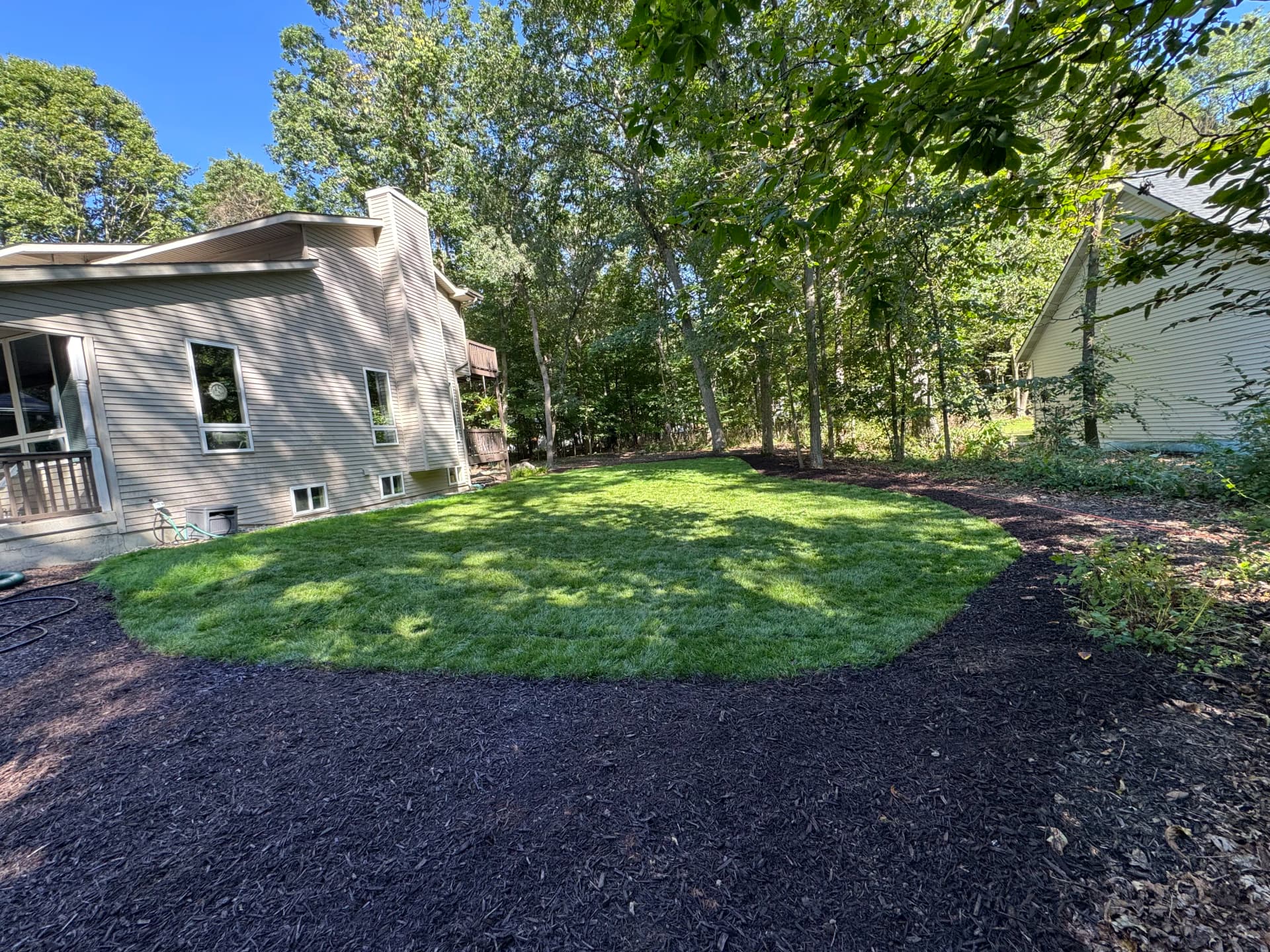 Full Lawn Rehab With Sod Installation and Fresh Mulch Beds